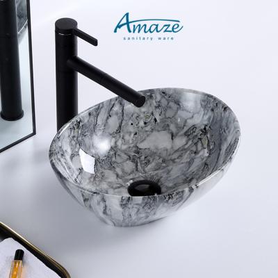 China New Design Dining Room Shape Countertops Art Oval Bowl Basin Modern Marble Bathroom Sink Ceramic Wash Basin en venta