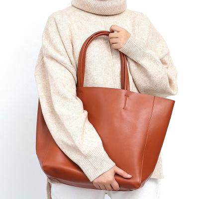 China Fashion Brand Luxury Cow Leather Tote Bags Designer Cowhide Handbags Women Shoulder Bags Fashion Large Capacity Liner Female Bag for sale