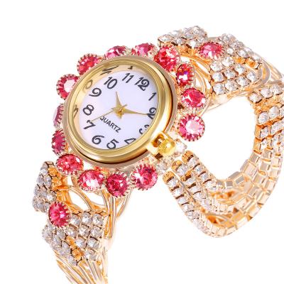 China Popular Fashion Luxury Diamond\Dress New Inlaid Women's Watch Alloy Personalized Quartz Watch Gold Strap Watch for sale