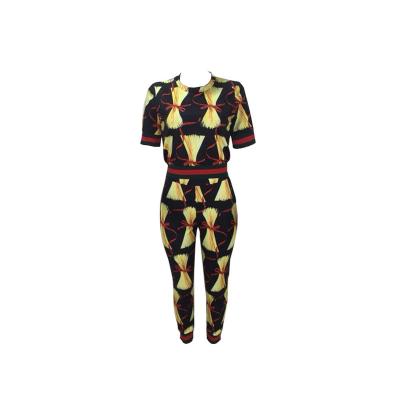 China Anti-pilling new ladies leisure printed suit with red and green stripes for sale