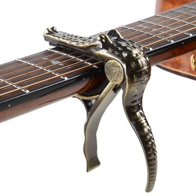 China GUITAR Alice A007G Crocodile Head Form Acoustic Guitar Change Air Capo Folk Fast Tuning Bronze Brand New for sale