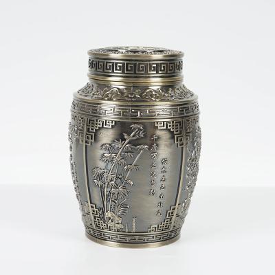 China Meilan Bamboo Chrysanthemum Metal Tea Tin Cans Container Luxury Round Tea Tin Food For Cafe Decoration for sale