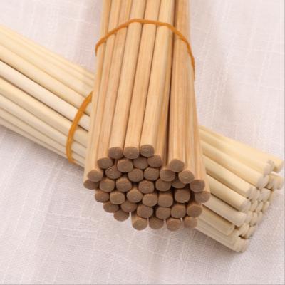 China Viable Bulk Custom Printed Round Disposable Bamboo Chopsticks With Logo Customized Print Chopsticks for sale