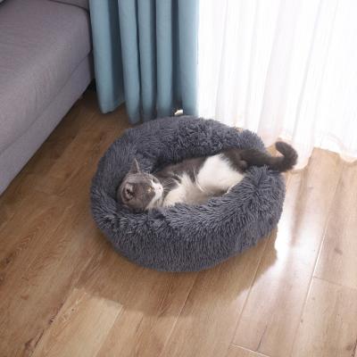 China Travel Manufacturers Top Selling Anti Worry Fluffy Plush Around Calming Nest Donut Cat Dog Pet Soft Warm Bed for sale