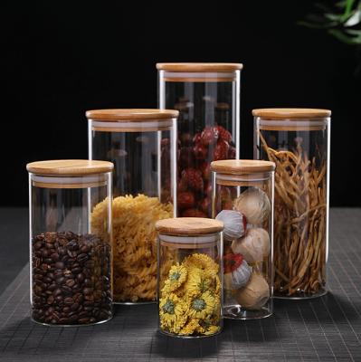 China Wholesale 250ml 500ml Empty Food Spice Candy Coffee Food Storage Containers Bottle Seal Bamboo Lid Glass Jars for sale