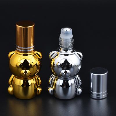 China High Quality Silver Coating Gold Shape Personal Care Custom Glass 8ml Mouse Roll On Perfume Bottle Empty Small Volume for sale