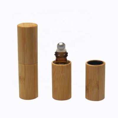 China Wholesale Fancy Personal Care Stock 5ML Essential Oil Bamboo Roll On Bottle With Steel Ball for sale