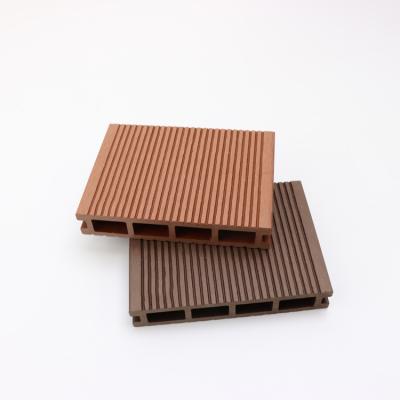 China Modern waterproof interlocking interlocking wpc flooring wpc patio hollow panel exterior decking for sale