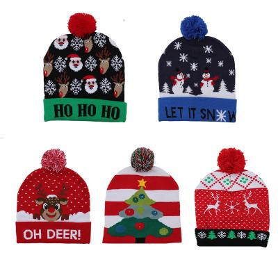 China Outdoor Activity Winter Santa Hat With Led Christmas Knitted Hats For Adults And Kids for sale