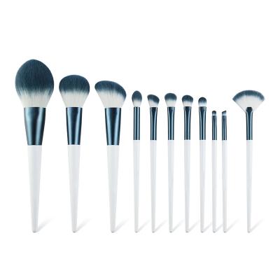 China Angular Blush Wooden 11pcs Wholesale Fiber Blue Hair Handle Makeup Brush Set for Dusting Cosmetic Tools for sale