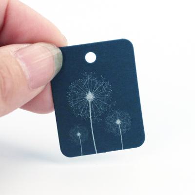 China 10 Color Fashion Sustainable Paper Small Dandelion Mini Hanger Tag For Jewelry Garment Label for sale