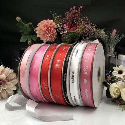 China Custom Single Face Polyester Satin Ribbon Printing Brand Logo Ribbon Gift Wrap Wedding for sale