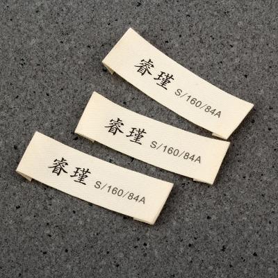 China Sustainable Printed Garment Label Cotton Apparel Sewing Label for sale