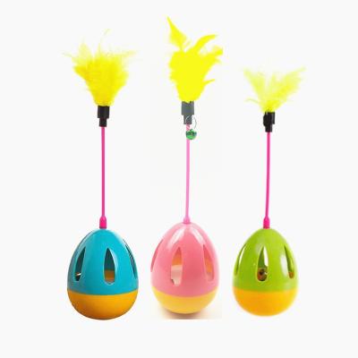 China Sustainable Eco-Friendly Treat Ball Dispensing Pet Dog Toys Funny Puzzle Cat Stick Slow Feeder Food Self-Hey Interactive Pet Ball Bell Chew Ball Dog for sale