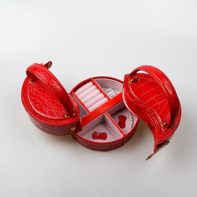 China 2022 new fashionable items shinning red color unique design easy carry red color OEM customized leather jewelry box for accessories for sale