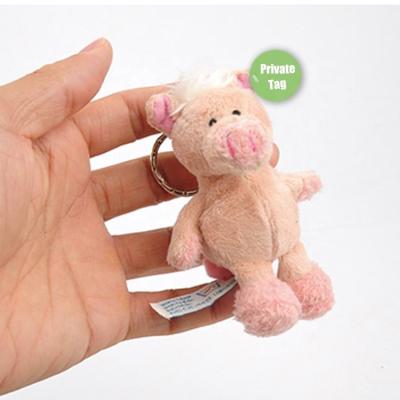 China Custom 10cm Mini Small Pets Jungle Stuffed Plush Toys Cheap Wild Soft Pig Mascot Head Chained Plush Toy for sale