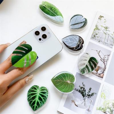 China Foldable Adjustable Acrylic Phone Holder Eject Mobile Phone Holder Stand Phone Grip With Leaf Design for sale