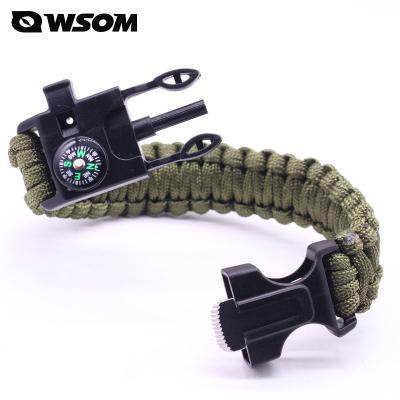 China Survival Lightweight Wristband Outdoor Survival Kit with Adjustable Whistle Compass Fire Starter Wristband for sale