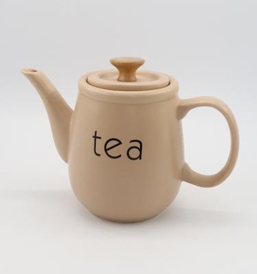 China Taupe Color Simply Light Matte Glaze Porcelain Ceramic Tea Pot With Lid Wood Handle In Stock for sale