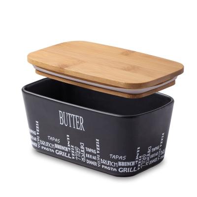 China Sustainable Hot Selling Butter Keeper Container With Cover Ceramic Butter Dishes With Wooden Lid for sale