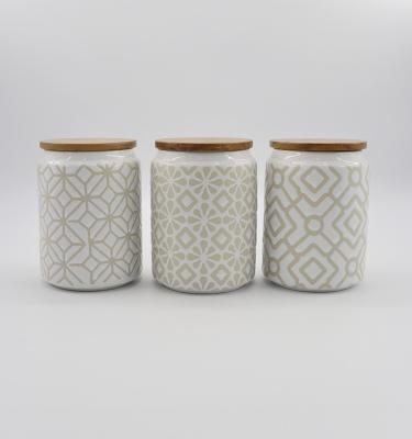 China Sustainable Plant Wholesale Unique Storage Jar With Wooden Lid Ceramic Canisters Sets For Kitchen Storage for sale