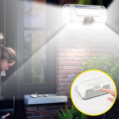 China Outdoor Waterproof LED Solar Wall Light Motion Sensor Remote Control Security Lamp for sale