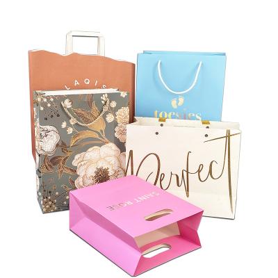 China Recycled Materials Wholesale Luxury Shoes Clothes Kraft Paper Bags Printed Logo Custom Packaging Paper Bag Clothing Shopping Gift Jewelry for sale