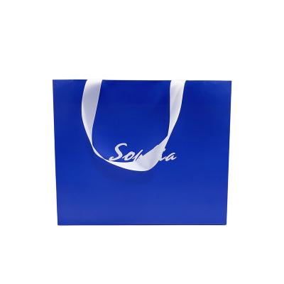 China Custom Recycled Logo Design Retail Shopping Paper Sale Materials Premium Eco-friendly Gift Bag Bag With Ribbon Handle for sale