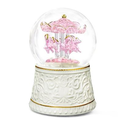 China European Style Brushed Glass Process Integrated Carousel Crystal Ball Music Box for sale