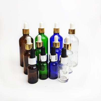 China 30ml cosmetic cbd hemp oil essential oil blue amber clear glass bottle with custom logo printing for sale