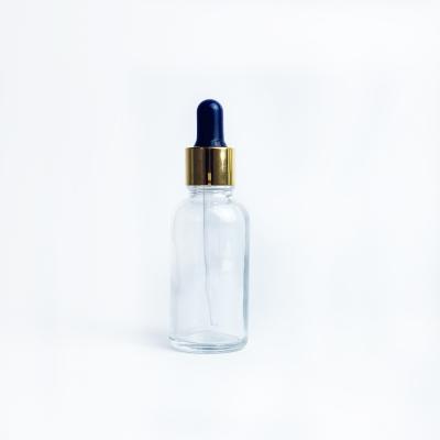 China Round Essential Oil Dropper Bottle 1oz 30ml e Serum Clear Glass Liquid Cosmetic Bottle In Stock for sale