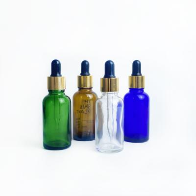 China Essential Oil Cosmetic Bottle Packaging 30ml Green Blue Amber Clear Glass Dropper Bottle For E Liquid for sale