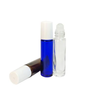 China 10ml Cosmetic Clear Glass Roll On Essential Oil Perfume Bottles Roll Ball Glass Bottle With Plastic Lid for sale