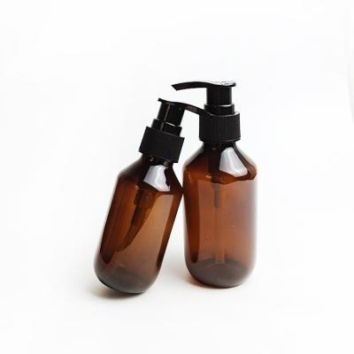 China Custom HDPE Cosmetic Color 500ml Amber Pet Plastic Hair Oil Bottle Shampoo Bottles With Pump Lids Cap for sale