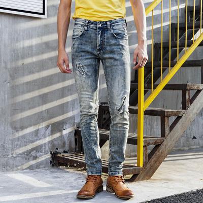 China High Street Brand Fashionable Personality Jeans Light Blue Cross Printing Mens Jeans Breathable Pants for sale