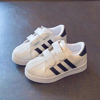 China 2022 new small white boys shoes breathable shell headboard shoes students sports shoes for sale