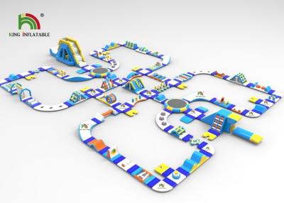 중국 0.9mm 플라토 PVC는 61x41m 활주를 가진 파란 팽창식 뜨 물 공원을 주문을 받아서 만들었습니다 판매용