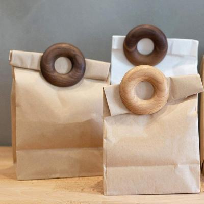 China Sustainable Donut Shape Staple Wood Sealing Coffee Bags Clamp For Home Kitchen Seal Storage for sale