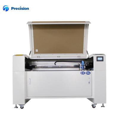 China 1390 Stainless Steel CO2 Laser Metal Cutter Water Cooled CO2 Laser Metal Cutting Machine for sale