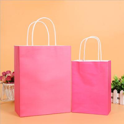 China Recyclable Portable White Kraft Paper Bag Shopping Clothes Advertising Handbag for sale