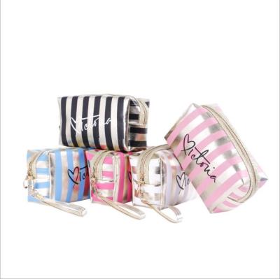 China Fashion High Quality Simple Letter Fashion Wholesale High Capacity Cosmetic Bags Toiletry Bag Cosmetic Bags for sale