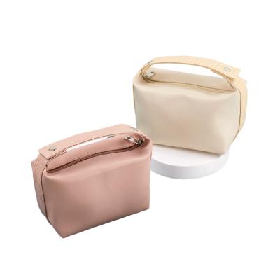 China Fashion New Trendy Fashion Solid Color Waterproof Casual Travel Cosmetic Bag Luxury Cosmetic Bag Toiletry Bag For Women for sale