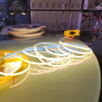 China Office DC24V 384LED/M Width 8mm High Brightness Flexible COB Strips Neon Strips Cabinet Lights Lighting Home Decorative Lighting for sale