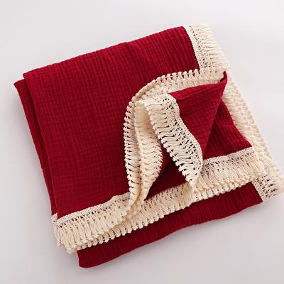 China Anti-Bacteria Logo Fringe Crinkle Cotton Muslin made to order Gauze Blanket Cotton Muslin Baby blankets with tassel for sale