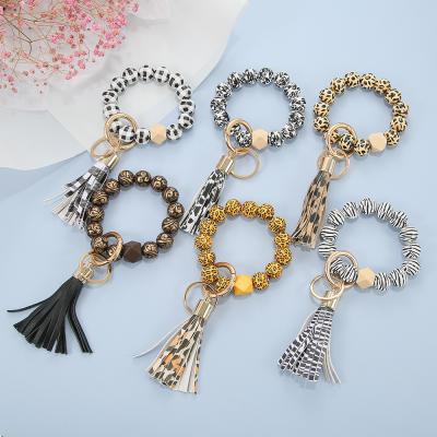 China Environmental Friendly Wood Beaded Bracelet Key Chain Key Chain Wristlet Keychain Women For Circle Wrist Bracelet for sale