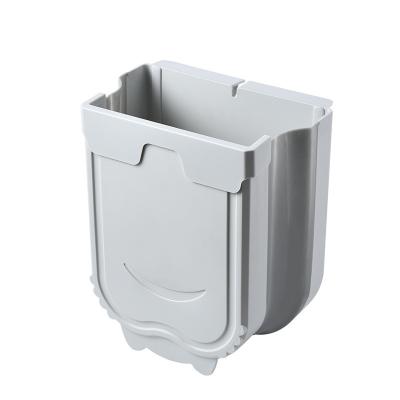 China Modern Kitchen Folding Hanging Plastic Bin Space Saving Car Trash Food Residue Waste Paper Barrel for sale