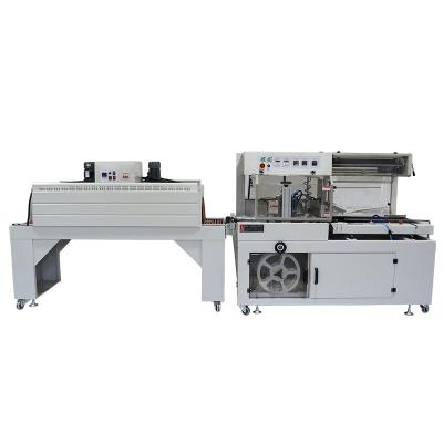 China Cosmetic Daily Necessities Side Sealing Shrinking Tunnel Shrink Wrapping Machine for sale