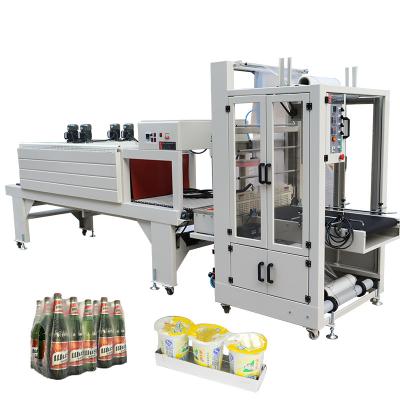 Cina 1400W Bottiglie d'acqua elettriche e lattine Film Packaging Shrink Wrap Machine in vendita