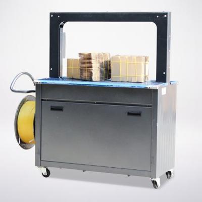 Cina 1300*700*1600cm Automatica elettrica PP cintura di fasciatura Strapping Machine per imballaggio cartone in vendita