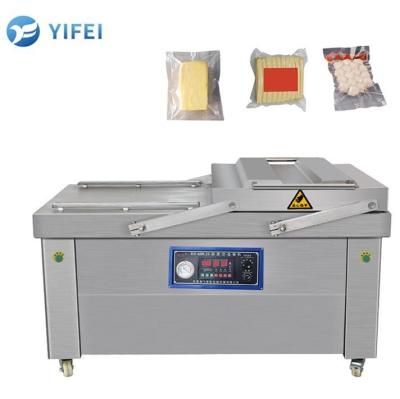 China Máquina automática de embalaje a vacío de doble cámara para carne salada, pescado seco, carne de cerdo, carne de res y arroz en venta